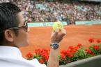 Aaron Kwok wearing a Longines Hydroconquest watch at Roland Garros