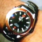 A close up of Mark Harmons Omega Seamaster Planet Ocean in Episode 6 of Season 6