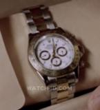 Jin opens the gift box containing the Rolex Oyster Perpetual Cosmograph Daytona 