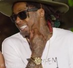 Lil Wayne wears a gold Rolex Sky Dweller in the music video Brown Sugar from Ray J.