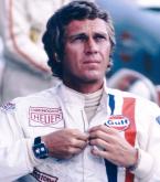 Steve McQueen wearing a TAG Heuer Monaco and his Gulf outfit