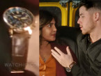 Nick Jonas wears a rose gold watch with blue dial on a brown strap in Love Again (2023).