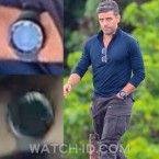 Oscar Isaac (pictured here on the set of the film) wears a Suunto Core All Black SS014279010 in Triple Frontier.