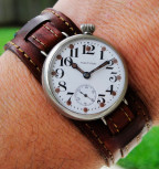 Not the same but a similar "WWI trench watch" with angled case, Arabic numerals and subdial