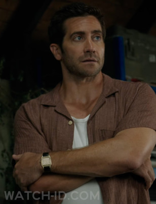 Jake Gyllenhaal wears a Cartier Santos-Dumont watch in the movie In The Grey.
