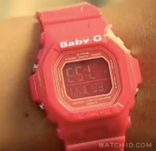 The strangely modified Casio Baby-G, upside down with a digitally added white Ba