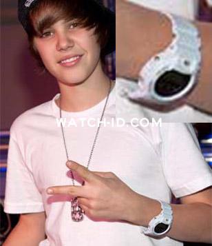Justin Bieber making his usual peace sign while wering a white Casio G-Shock