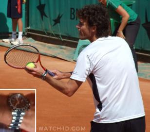 Kuerten wearing the Longines Admiral during an exhibition match with winners of 
