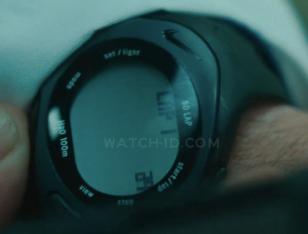 Russell Crowe sets the timer on his Nike Triax Speed 50 Super Watch in the movie