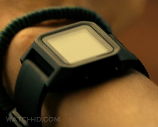 Charlize Theron wears a Nixon Staple watch in Apex.