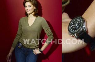 Stana Katic wears an Omega Speedmaster Professional in a promotional photo for t