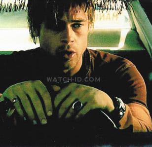 Brad Pitt wearing a Red Monkey Men's Classic watch with black leather strap and 