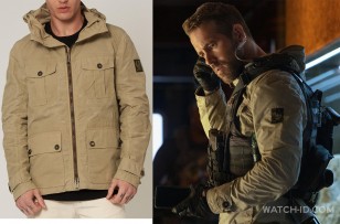 The jacket worn by Ryan Reynolds in 6 Underground is a Belstaff Sand Whitstone Parka.