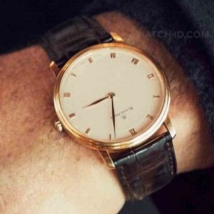 A close-up of Pierce Brosnan's personal Blancpain Villeret watch in a GQ magazine article