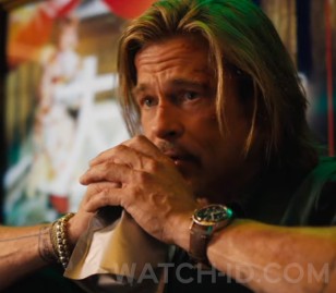 It also look slike Brad has a custom brown leather strap on his Breitling AVI watch in the film..