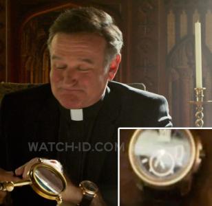 Robin Williams, as Father Monighan, wears a Calibre de Cartier watch in The Big 