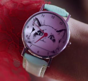 Taylor Swift wears a wristwatch with a cat face on the dial in the You Need To Calm Down music video.