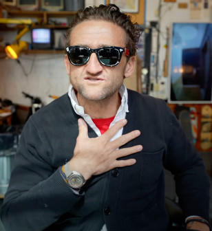 Casey Neistat wears a vintage DOXA Sub 300T Searambler watch in his latest video "AI made this VLOG" (17 April 2023).