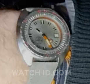 Close-up of the DOXA Sub 300T Searambler on Casey Neistat's wrist.