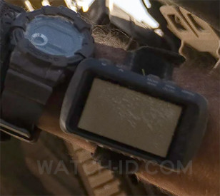 Next to his Casio G-SHOCK on his wrist, Jake Gyllenhaal wears a Garmin 010-01772-10 Foretrex 701 Ballistic Edition in Guy Ritchie's The Covenant.