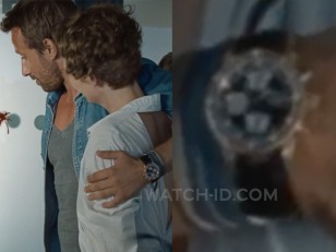 Matthias Schoenaerts wears a gold watch with black strap in A Bigger Splash