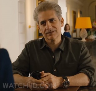 Michael Imperioli wears a black and gold Panerai Submersible QuarantaQuattro Goldtech OroCarbo in Season 2 of the HBO series The White Lotus.