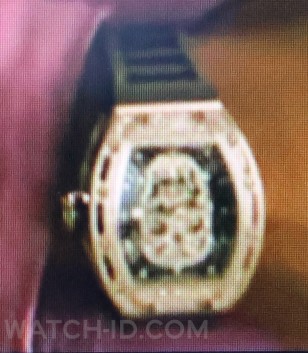 The watch in a later scene might be a different Richard Mille model, with steel or gold case set with diamonds.