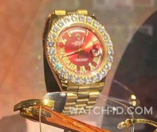 This Rolex Day-Date was on display at an Uncut Gems popup store in New York. It doesn't have the gem-set bracelet seen on the poster, but a clean gold bracelet,