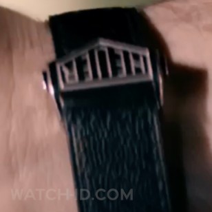 Scott Eastwood's TAG Heuer Monaco watch has a black leather strap with 'Heuer' buckle.